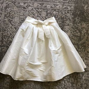 White knee length skirt